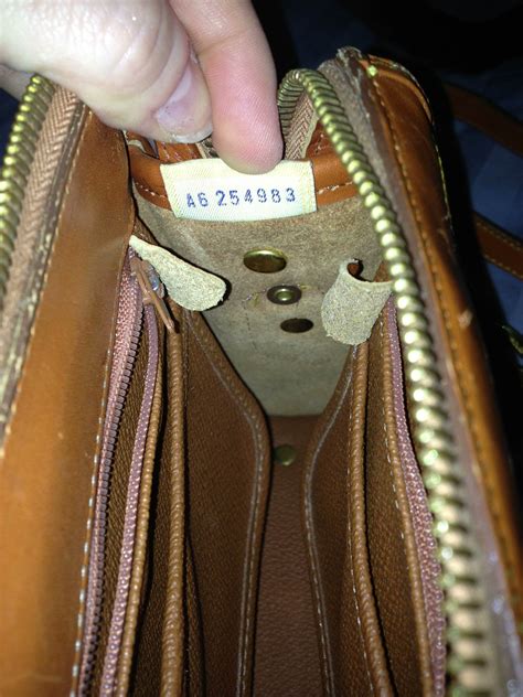 real vs fake dooney and bourke bag|how to tell if dooney & bourke is real.